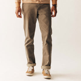 fit model standing in The Camp Pant in Stone Chipped Canvas, Bottoms by Taylor Stitch