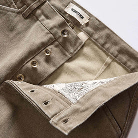 material shot of the button fly on The Camp Pant in Stone Chipped Canvas, Bottoms by Taylor Stitch