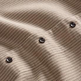 material shot of the buttons on The Conrad Shirt in Black Coffee Stripe, Wovens by Taylor Stitch