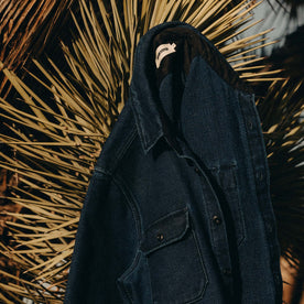 editorial image of The Division Shirt in Indigo Twill on a plant, Wovens by Taylor Stitch