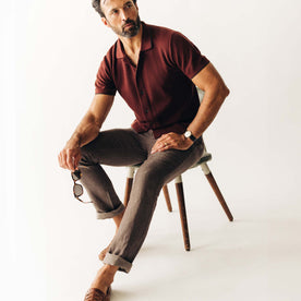 fit model sitting on a stool wearing The Easy Pant in Cocoa Linen, Bottoms by Taylor Stitch