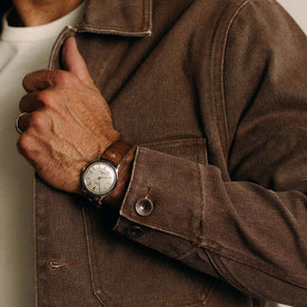 fit model adjusting The Fremont Jacket in Aged Penny Chipped Canvas, Outerwear by Taylor Stitch