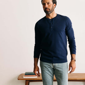 fit model walking wearing The Heavy Bag Henley in Navy, Knits by Taylor Stitch