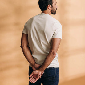 fit model showing off the back of The Heavy Bag Tee in Natural, Knits by Taylor Stitch