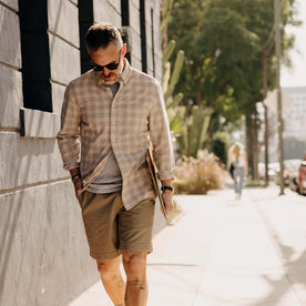 fit model walking wearing The Jack in Heather Flax Plaid, Wovens by Taylor Stitch