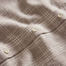 material shot of the buttons on The Jack in Heather Flax Plaid, Wovens by Taylor Stitch