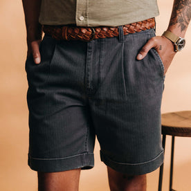 fit model with his hands in his pockets wearing The Matlow Short in Dark Navy Herringbone, Bottoms by Taylor Stitch