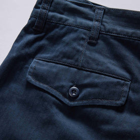 material shot of the back pocket on The Matlow Short in Dark Navy Herringbone, Bottoms by Taylor Stitch