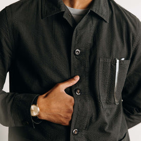 fit model showing off the buttons on The Ojai Jacket in Faded Black Seersucker, Outerwear by Taylor Stitch