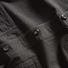 material shot of the buttons on The Ojai Jacket in Faded Black Seersucker, Outerwear by Taylor Stitch