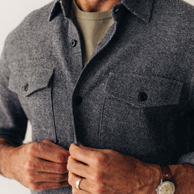 fit model buttoning up The Point Shirt in Heather Blue Linen Tweed, Wovens by Taylor Stitch