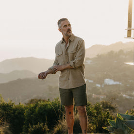 fit model adjusting the cuffs on The Point Shirt in Heather Oat Linen Tweed, Wovens by Taylor Stitch