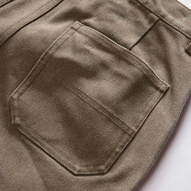 material shot of the back pockets on The Camp Short in Stone Chipped Canvas, Bottoms by Taylor Stitch