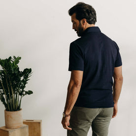 fit model showing off the back of The Short Sleeve California in Rinsed Indigo Slub, Wovens by Taylor Stitch