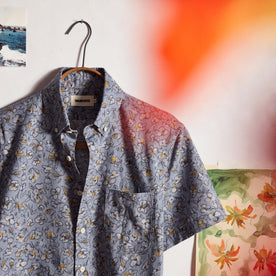 editorial image of The Short Sleeve Jack in Light Blue Floral on a hanger, Wovens by Taylor Stitch