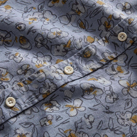 material shot of the buttons on The Short Sleeve Jack in Light Blue Floral, Wovens by Taylor Stitch