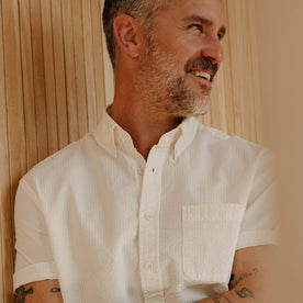 fit model showing off the front of The Short Sleeve Jack in Natural Seersucker, Wovens by Taylor Stitch