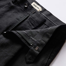 material shot of the zipper fly on The Thomas Trouser in Coal Linen Twill, Bottoms by Taylor Stitch