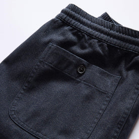 material shot of the back pocket of The Apres Pant in Navy Twist Jaspe Twill, Bottoms by Taylor Stitch