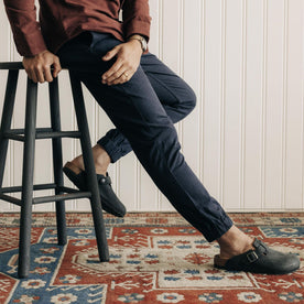 fit model sitting in The Apres Pant in Navy Twist Jaspe Twill, Bottoms by Taylor Stitch