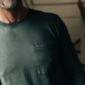 fit model showing the front chest pocket on The Cotton Hemp Long Sleeve Tee in Dark Forest, Knits by Taylor Stitch