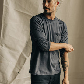 fit model adjusting sleeves on The Cotton Hemp Long Sleeve Tee in Charcoal, Knits by Taylor Stitch