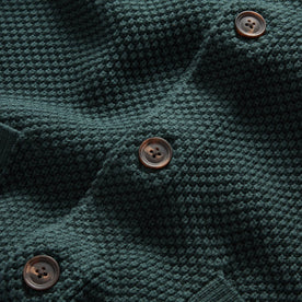 material shot of the buttons on The Crawford Sweater in Dark Forest, Knits by Taylor Stitch