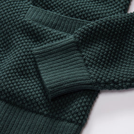 material shot of the sleeves on The Crawford Sweater in Dark Forest, Knits by Taylor Stitch