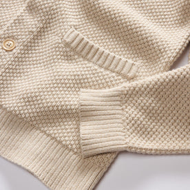 material shot of the sleeves on The Crawford Sweater in Marled Natural, Knits by Taylor Stitch