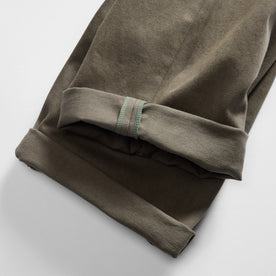 material shot of the selvage cuffs on The Democratic All Day Pant in Fatigue Olive Selvage Denim, Bottoms by Taylor Stitch