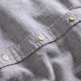 material shot of the buttons on The Jack in Blue Sky Slub Cotton Linen, Wovens by Taylor Stitch