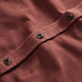 material shot of the buttons on The Maritime Shirt Jacket in Black Cherry Moleskin, Wovens by Taylor Stitch