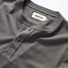 material shot of the collar on The Organic Cotton Henley in Faded Black, Knits by Taylor Stitch