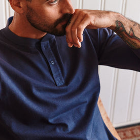 fit model posing in The Organic Cotton Henley in Navy, Knits by Taylor Stitch