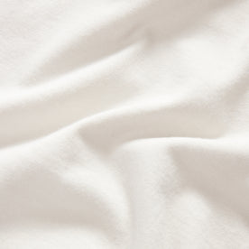 material shot of the fabric on The Organic Cotton Henley in Vintage White, Knits by Taylor Stitch