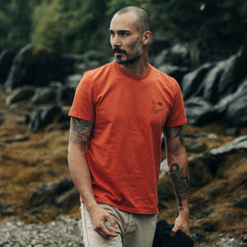 fit model walking wearing The Organic Cotton Tee in Coastal Trail, Knits by Taylor Stitch