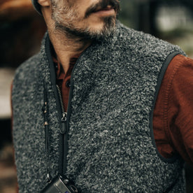 fit model showing off the collar on The Port Vest in Coal Marl Boucle Fleece, Outerwear by Taylor Stitch