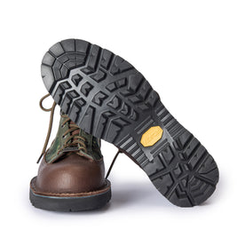 material shot of the vibram soles of The Ridge Boot in Painted Camo, Footwear by Taylor Stitch