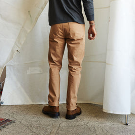 fit model showing off the back of The Slim All Day Pant in Tobacco Selvage Denim, Bottoms by Taylor Stitch