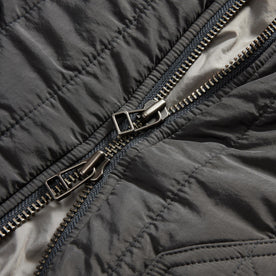 material shot of the two way zipper on The Able Jacket in Faded Black Quilted Nylon, Outerwear by Taylor Stitch