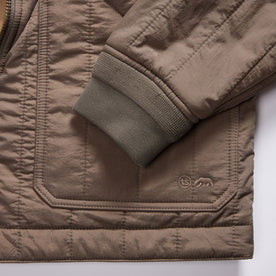 material shot of the cuffs on The Able Jacket in Morel Quilted Nylon, Outerwear by Taylor Stitch