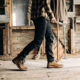 fit model walking in The Democratic Jean in Black Nihon Menpu Selvage, Bottoms by Taylor Stitch