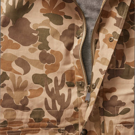 material shot of the zipper and snap buttons on The Explorer Jacket in Vintage Arid Camo Dry Wax, Outerwear by Taylor Stitch