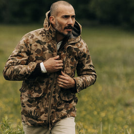 fit model walking in The Explorer Jacket in Vintage Arid Camo Dry Wax, Outerwear by Taylor Stitch