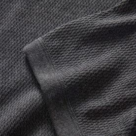 material shot of the sleeve on The Heavy Bag Waffle Short Sleeve in Faded Black, Knits by Taylor Stitch