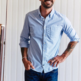 fit model with his hand in his pocket wearing The Jack in Blue Everyday Oxford, Wovens by Taylor Stitch