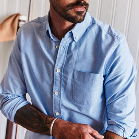 fit model adjusting sleeves on The Jack in Blue Everyday Oxford, Wovens by Taylor Stitch