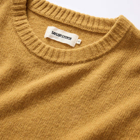 material shot of ribbed neck opening on The Lodge Sweater in Gold, Knits by Taylor Stitch