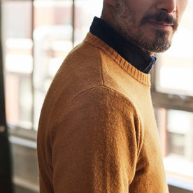 fit model showing the side of The Lodge Sweater in Gold, Knits by Taylor Stitch