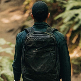 fit model showing off the back of The Merino Half Zip in Forest, Knits by Taylor Stitch